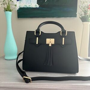Elegant Black Handbag with Gold Accents